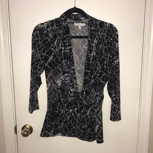 Black and white polyester draping v-neck blouse